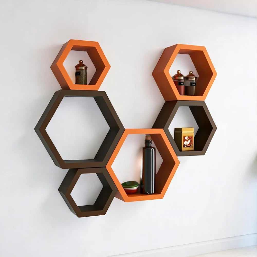 Hexagonal wall shelves with orange and black designs.